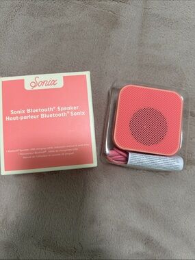 Sonix Coral Pink Portable Bluetooth Speaker with Wrist Strap